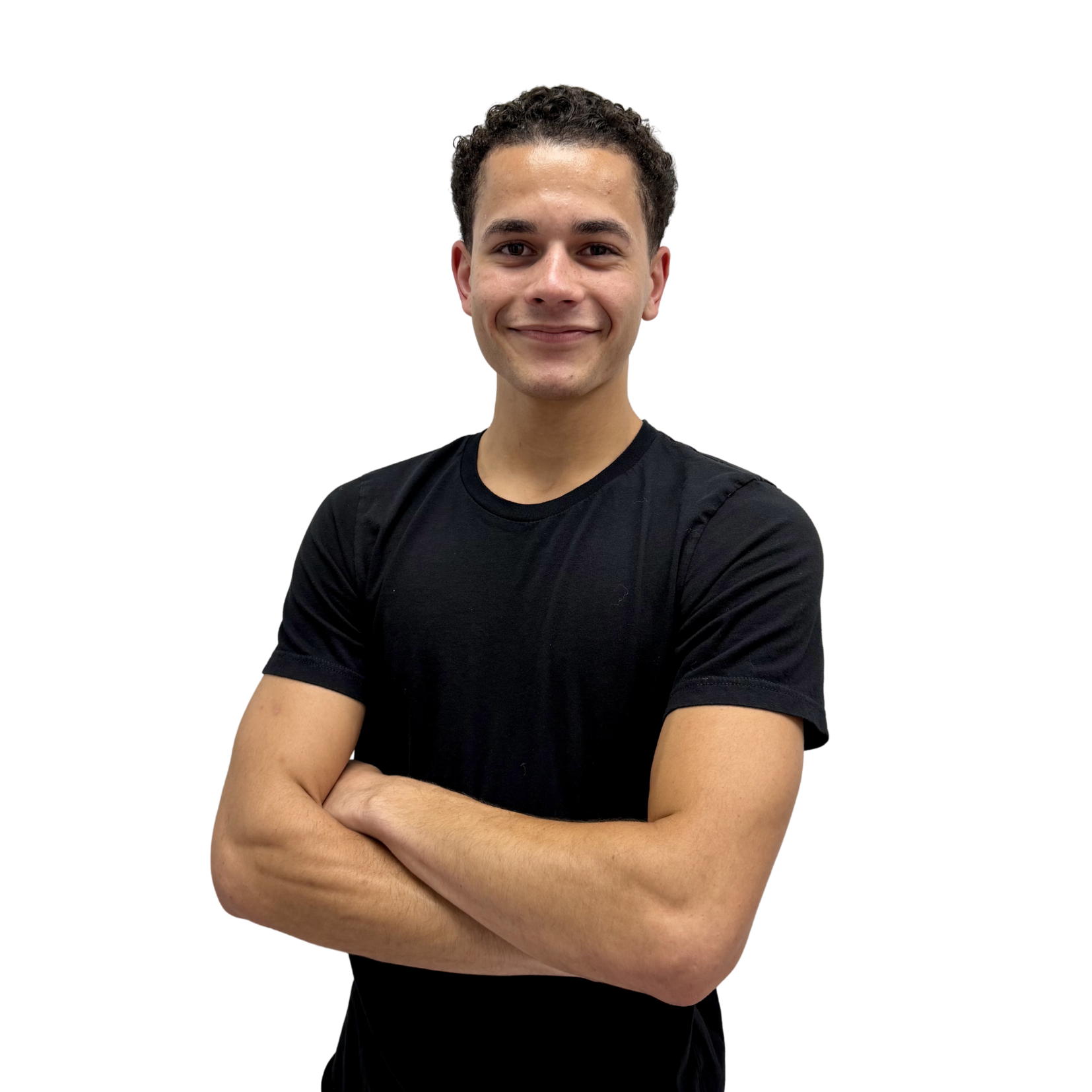 Smiling man with short dark hair in a black t-shirt, arms crossed, against a white background.